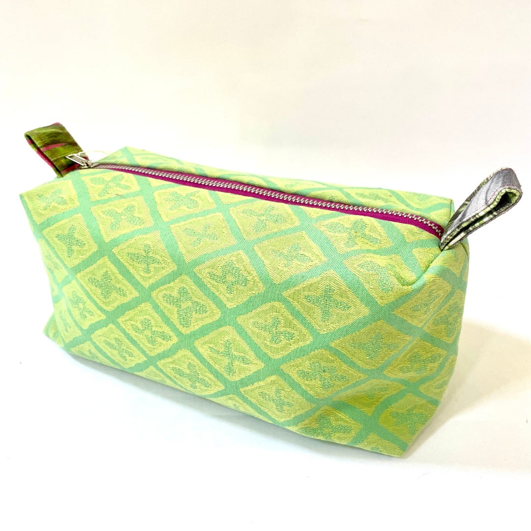 Using different fabric designs for our cosmetic bags enable us to pair style and function. Each bag is finished with a coloured zip and lining in either a Liberty of London cotton or a neon waterproof lining. Our bags are perfectly sized in order to fit all those goodies you like to travel with. Dimensions (approx)- height 13cm x length 25cm x depth 10cm