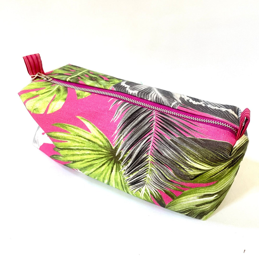 Using different fabric designs for our cosmetic bags enable us to pair style and function. Each bag is finished with a coloured zip and lining in either a Liberty of London cotton or a neon waterproof lining. Our bags are perfectly sized in order to fit all those goodies you like to travel with.  Dimensions (approx)- height 13cm x length 25cm x depth 10cm