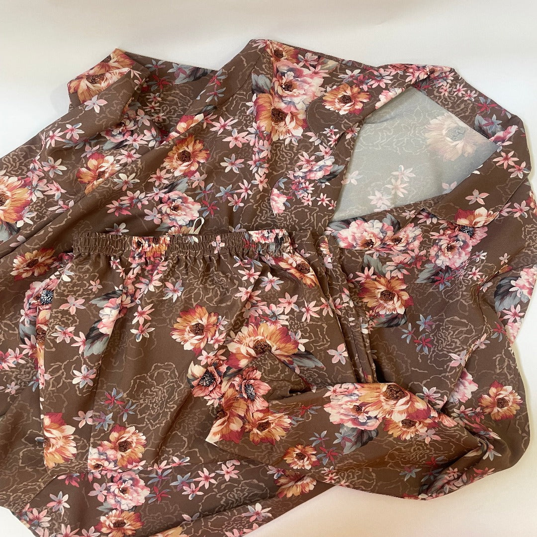 Beautiful silky soft satin pj's in various printed and plain armani satin. Long sleeves with button down front, long pants with drawstring and elastic at waist.