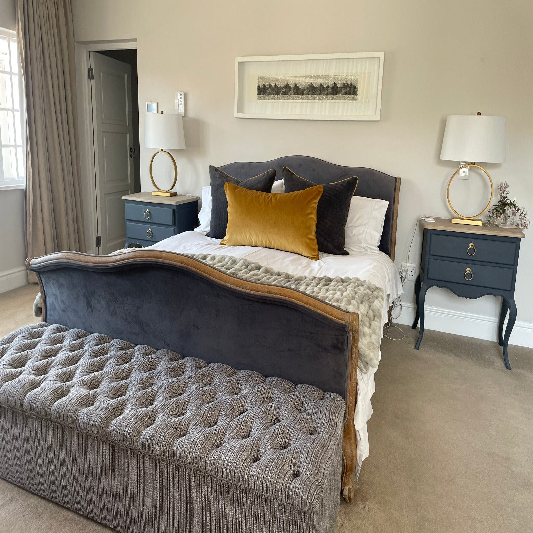 TEXTURES IN MONOCHROME FABRICS ADDS TO THE SOPHISTICATION OF THIS MAIN BEDROOM