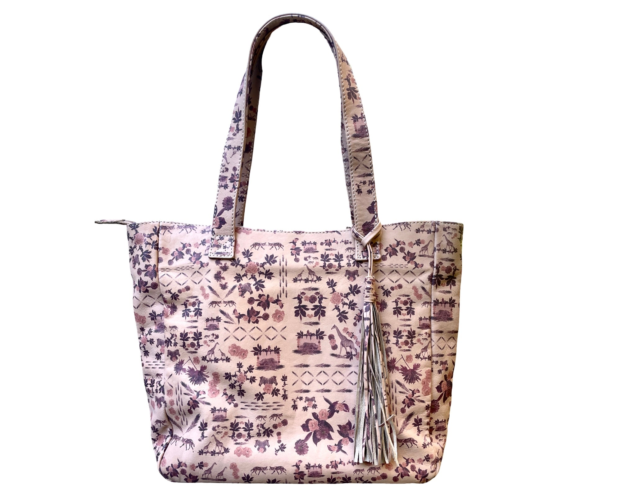 Exclusive Leather Tote Bag – Kendalle Bennett Edition

Crafted from premium A-grade leather, this exquisite tote bag showcases an exclusive print by renowned designer Kendalle Bennett. The design features a soft dusty pink background, beautifully contrasted with shades of mulberry and dark pink, illustrating African wild animals and native fauna in an elegant, artistic composition.

Every detail has been thoughtfully considered – from the luxurious leather finish to the protective base studs 