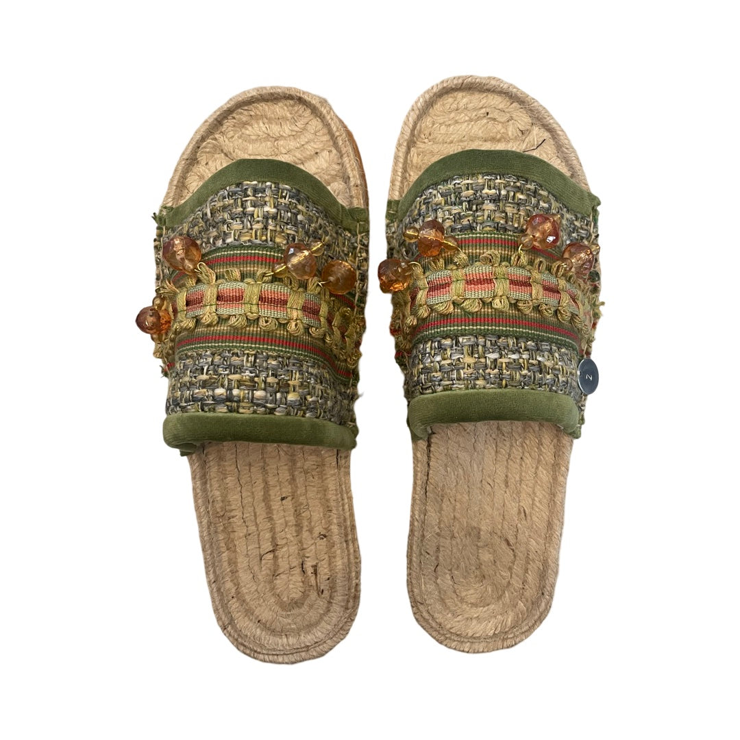 Hand crafted SLIDES - one of a kind.  Designed using a beautiful green fabric with peach colored trim and beaded detail.  Leather upper lining.  Non slip rubber soles.  All shoes have their own bag with drawstring for packing.